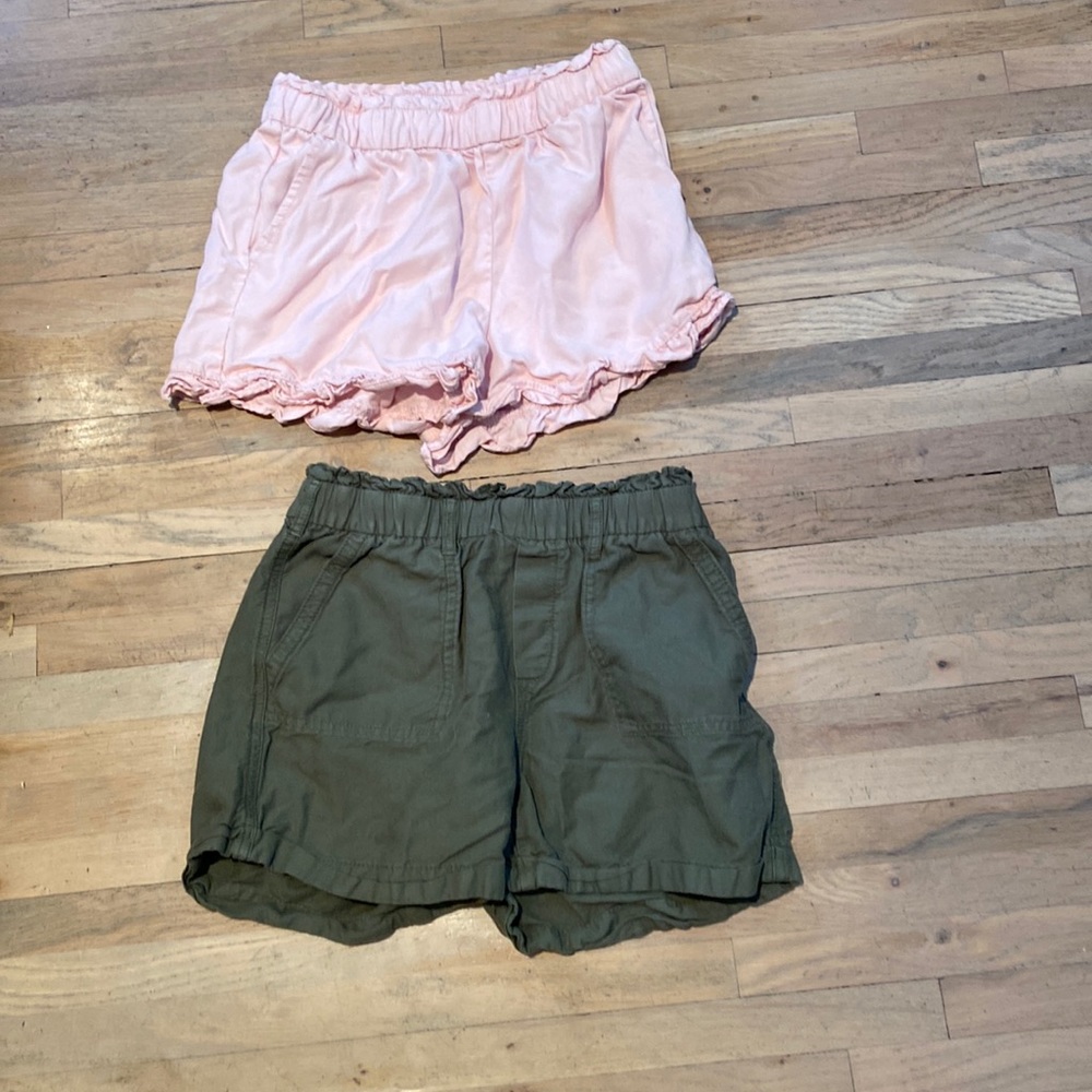 Two pairs of shorts, pink and green, size large, gap kids